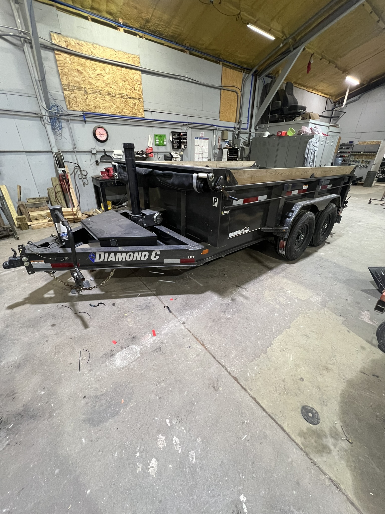 Dump trailer rental in Marseilles Illinois - 12ft Diamond C hydraulic dump trailer for landscaping and construction