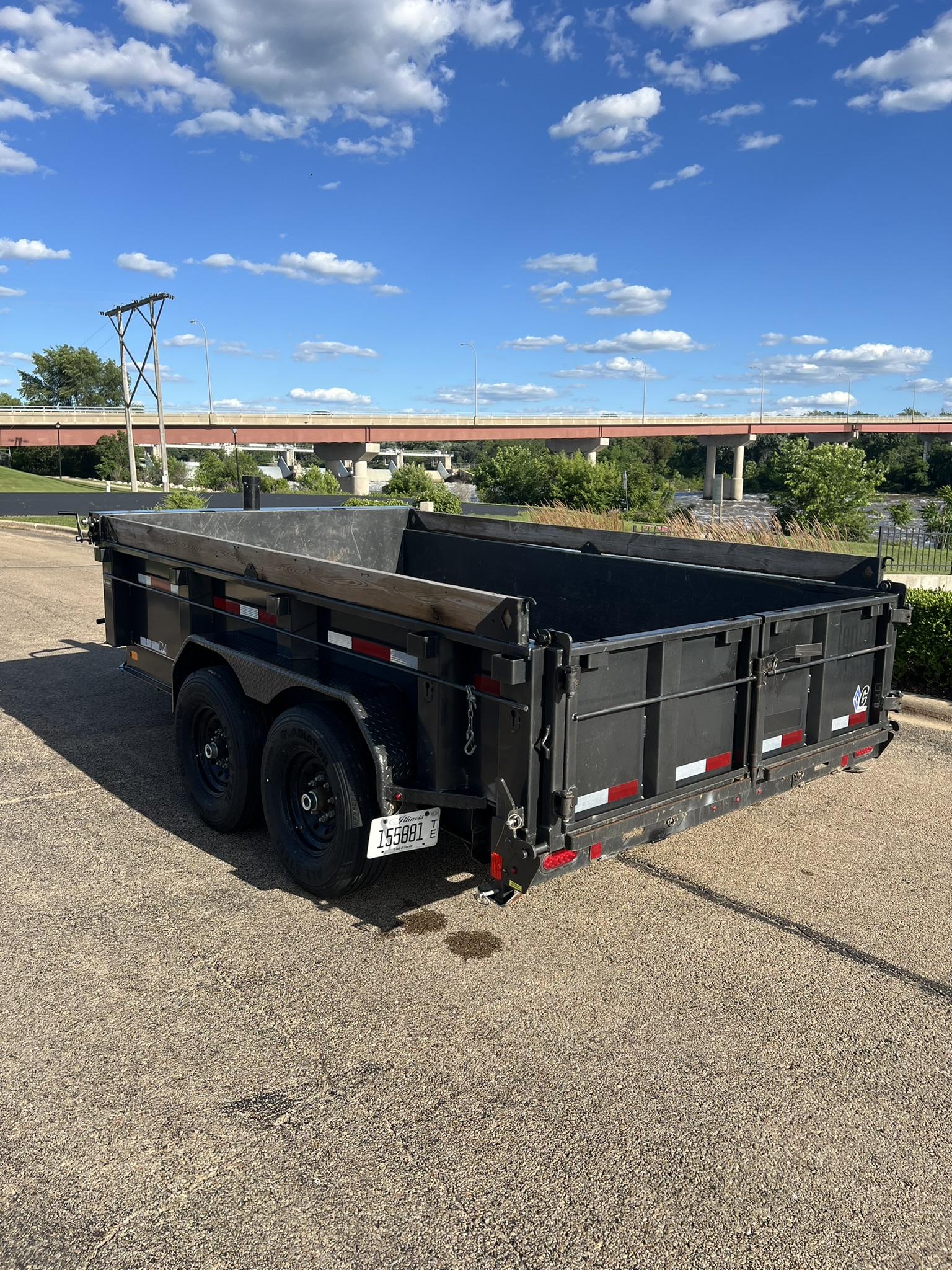 Diamond C dump trailer rear view showing tailgate and Illinois plate