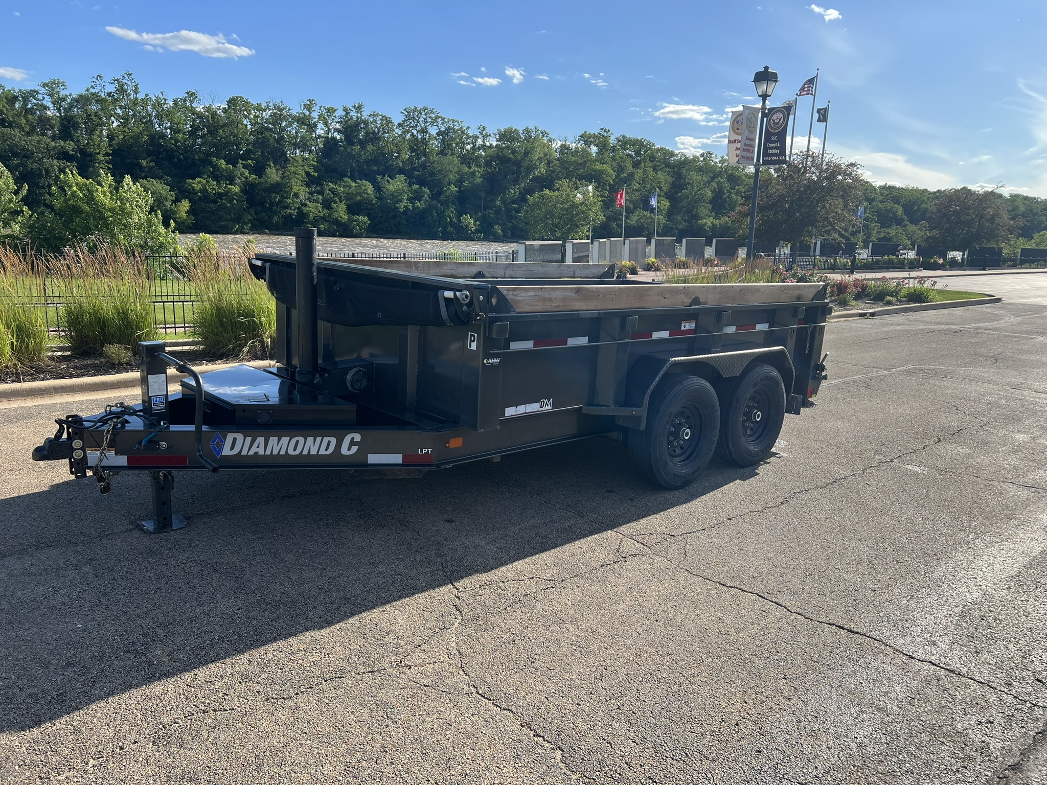 Diamond C LPT dump trailer side view in parking lot - available for rent in Marseilles IL