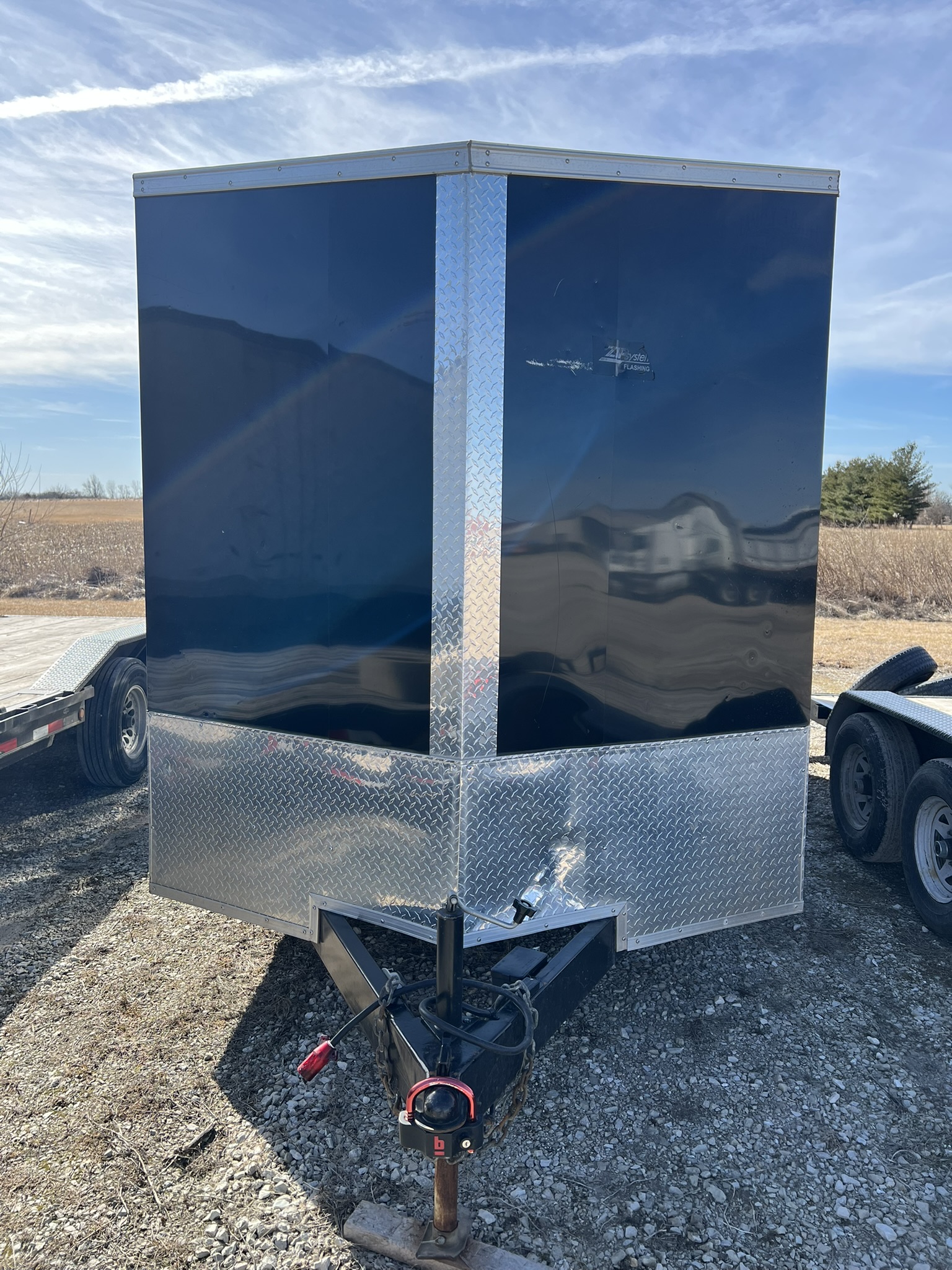Pace American enclosed cargo trailer front view with V-nose design