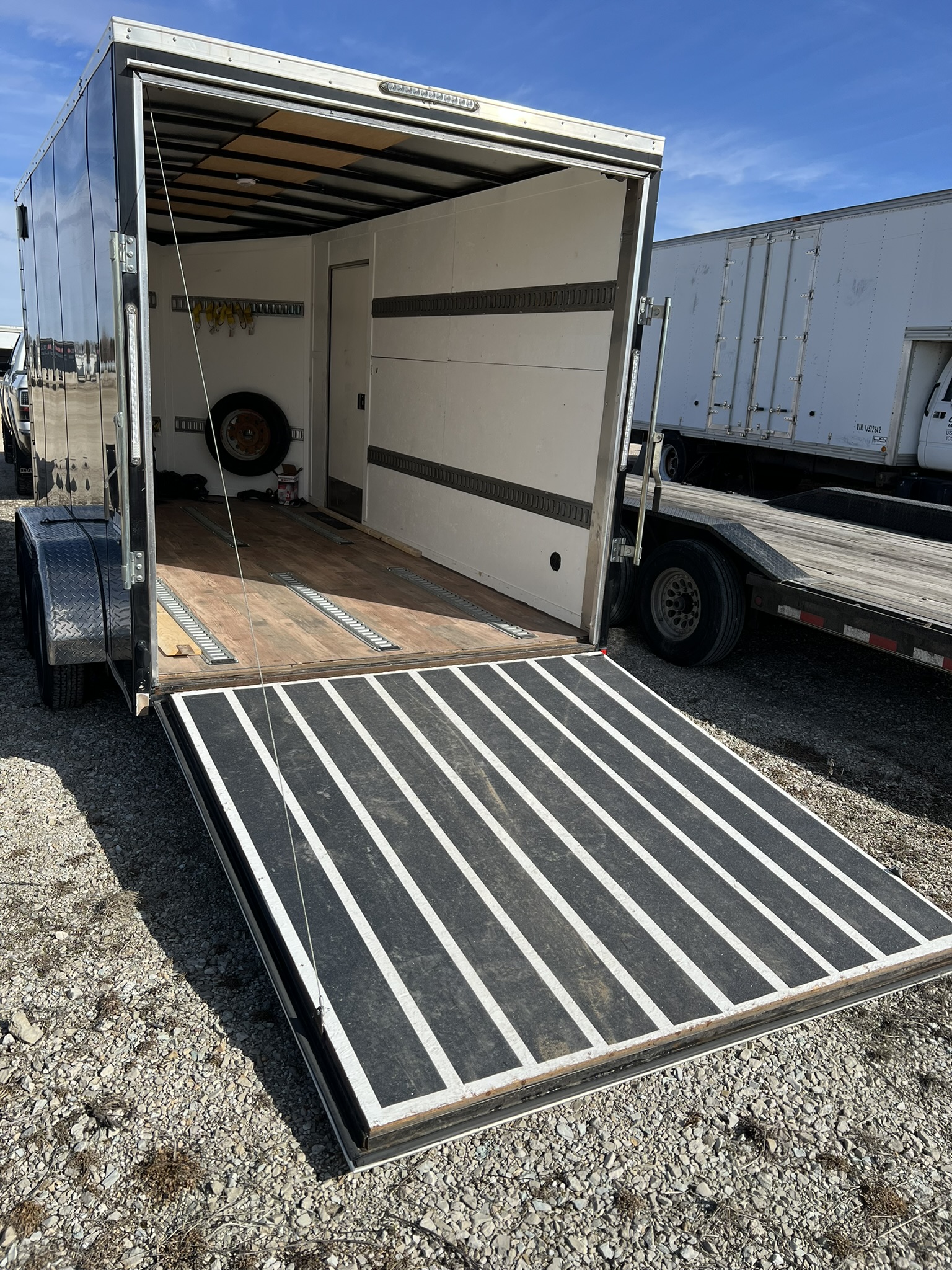 Pace American trailer interior with rear ramp door open for loading
