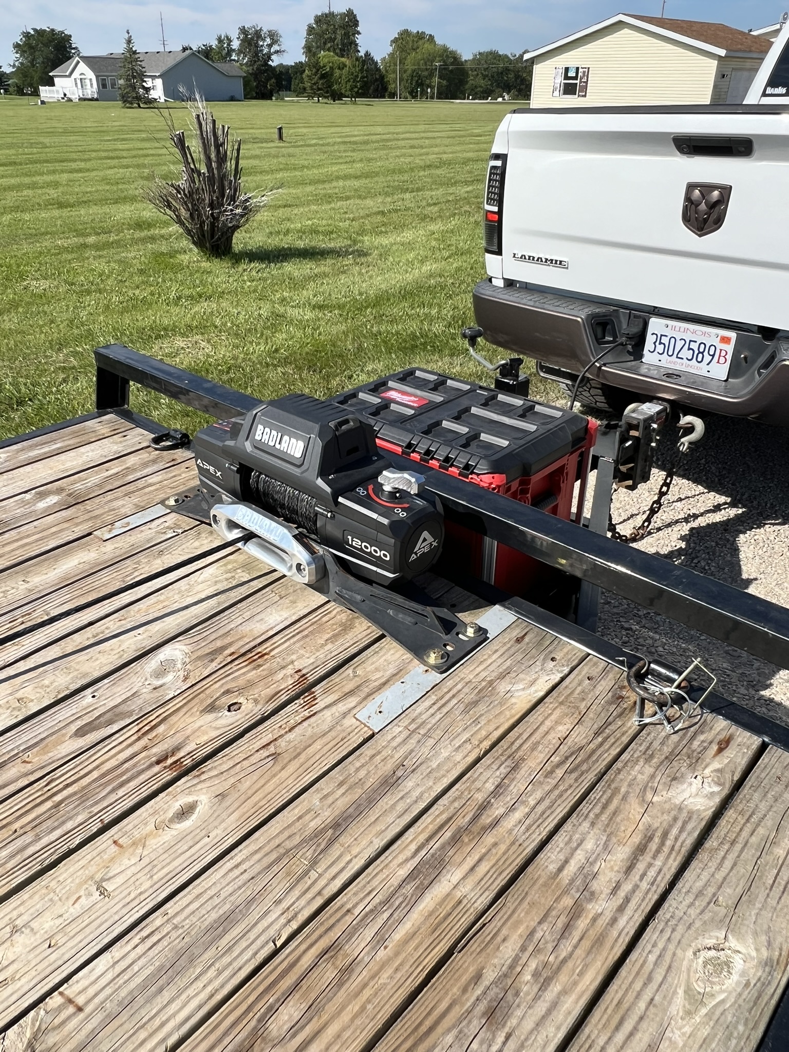 Badland 12000 electric winch detail on SureTrac car hauler trailer